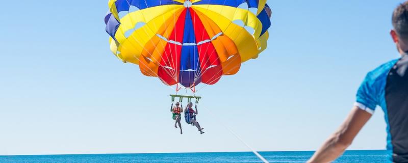 people parasailing over ocean